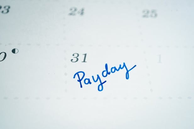 Calendar with payday written in ink